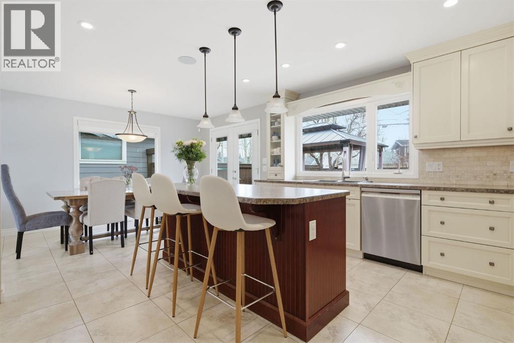 Single Family House 4 Level for Sale in  Lake Lucerne Drive SE Lake Bonavista Calgary 