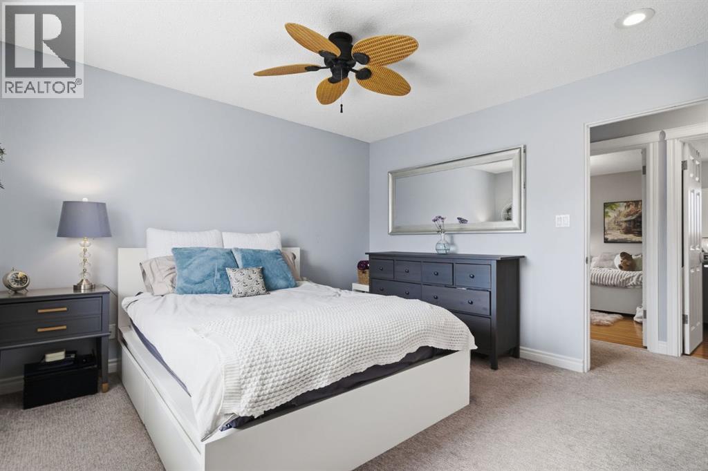 Single Family House 4 Level for Sale in  Lake Lucerne Drive SE Lake Bonavista Calgary 