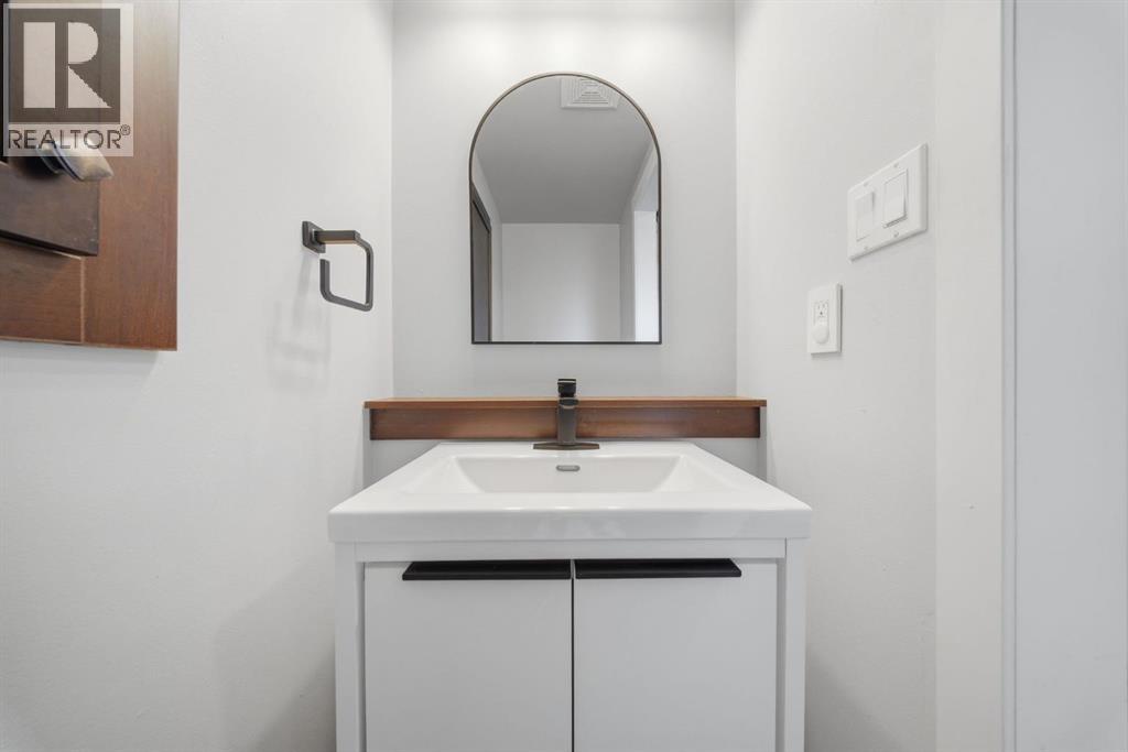 Single Family House 4 Level for Sale in  Lake Lucerne Drive SE Lake Bonavista Calgary 