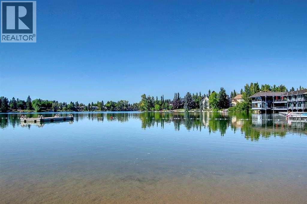 Single Family House 4 Level for Sale in  Lake Lucerne Drive SE Lake Bonavista Calgary 