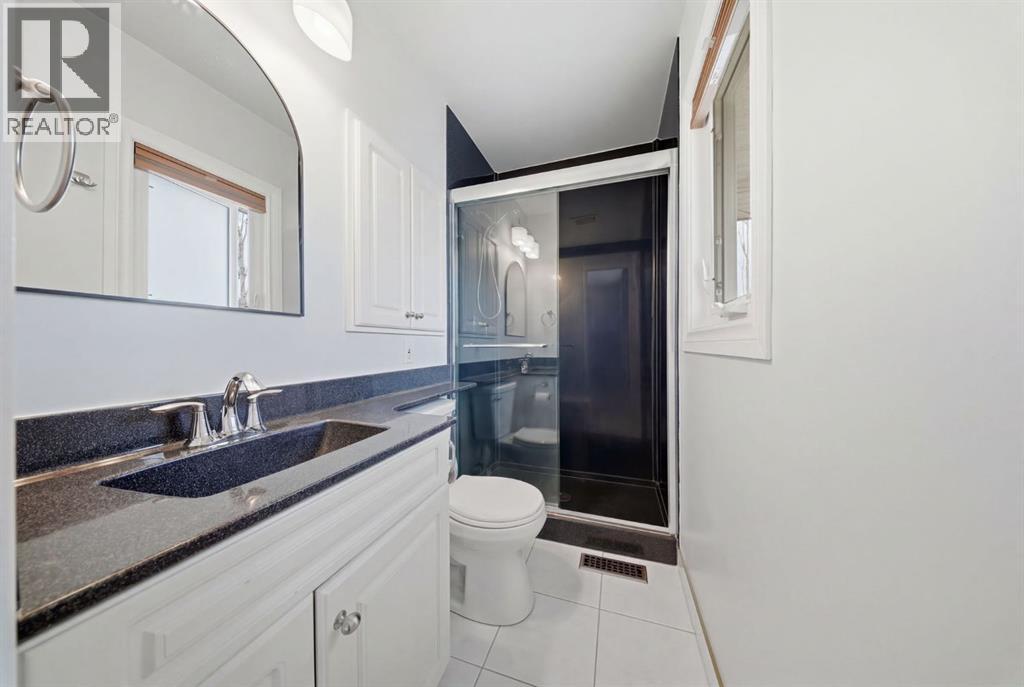 Single Family House 4 Level for Sale in  Lake Lucerne Drive SE Lake Bonavista Calgary 