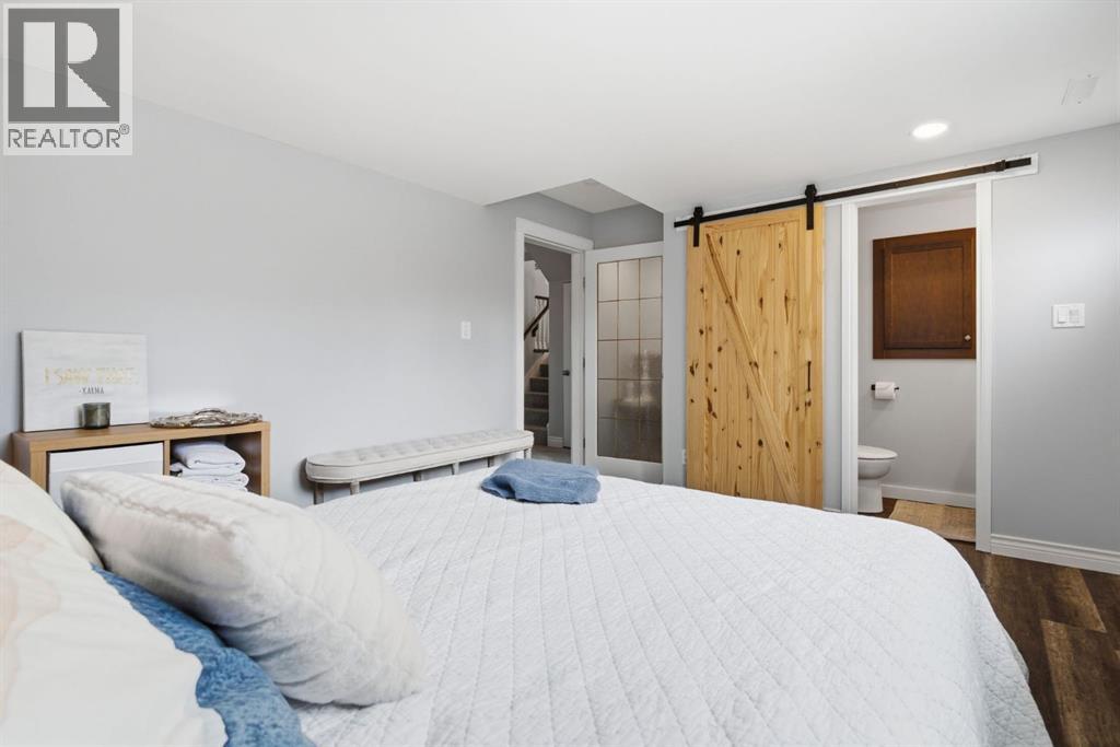 Single Family House 4 Level for Sale in  Lake Lucerne Drive SE Lake Bonavista Calgary 