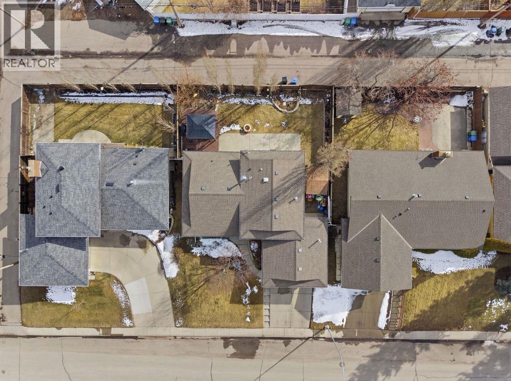 Single Family House 4 Level for Sale in  Lake Lucerne Drive SE Lake Bonavista Calgary 