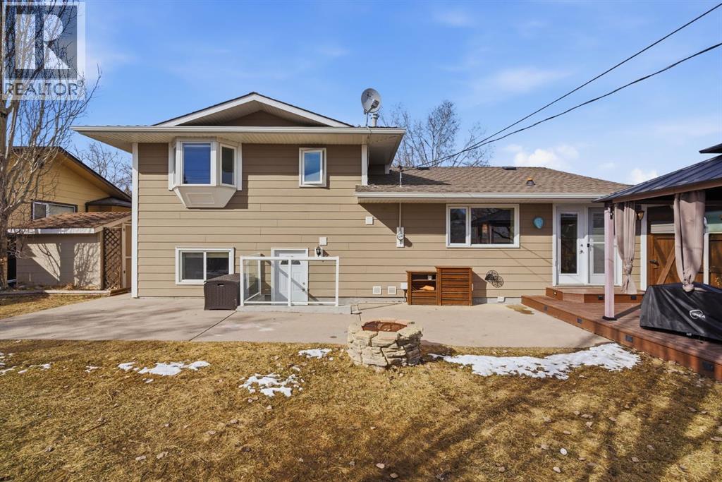 Single Family House 4 Level for Sale in  Lake Lucerne Drive SE Lake Bonavista Calgary 