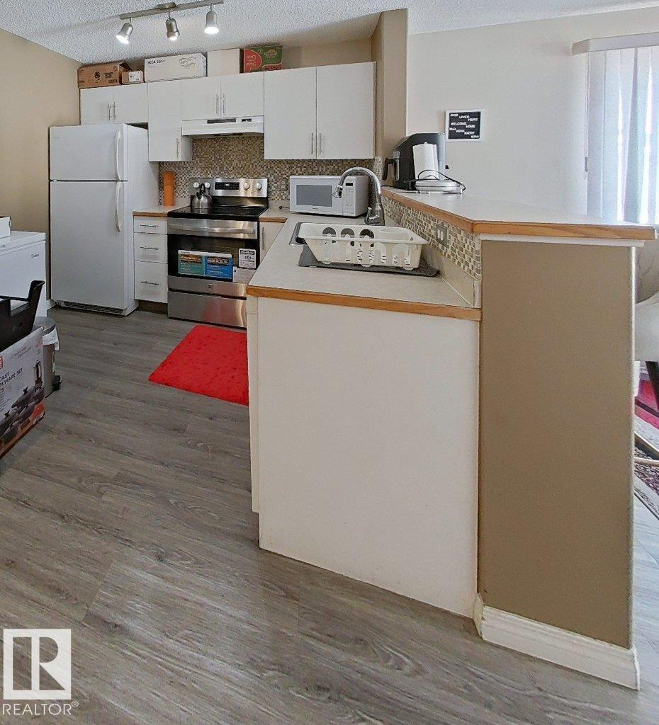 #203 14708 50 ST NW - 10