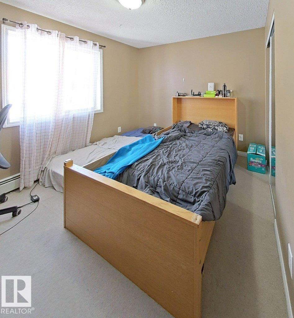 #203 14708 50 ST NW - 25