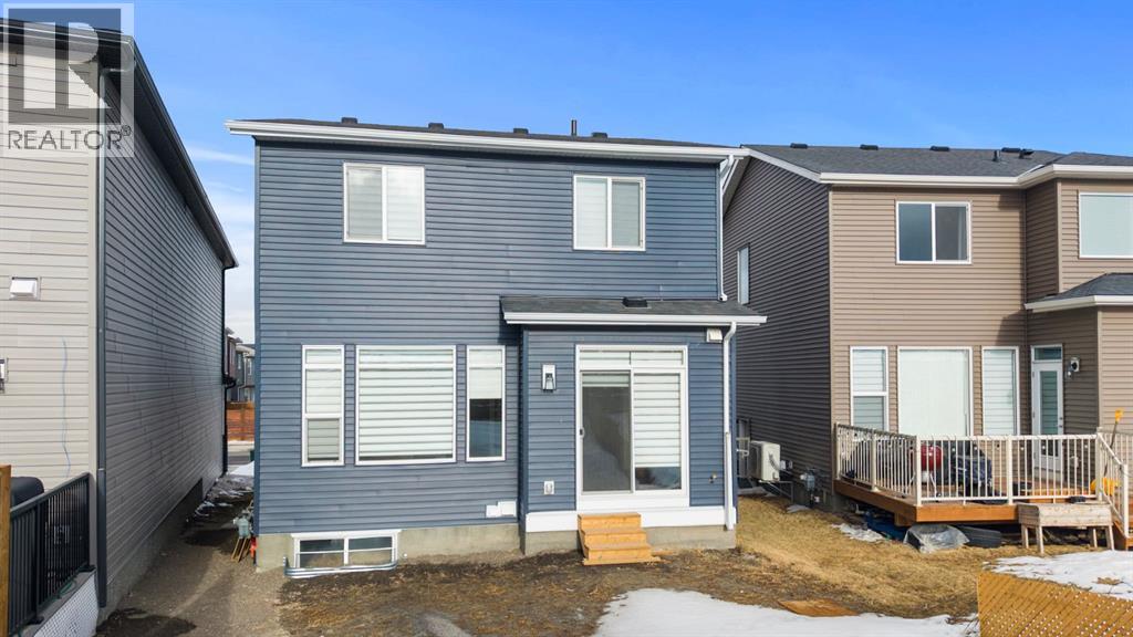 Single Family House for Sale in  Herron Mews NE Livingston Calgary 