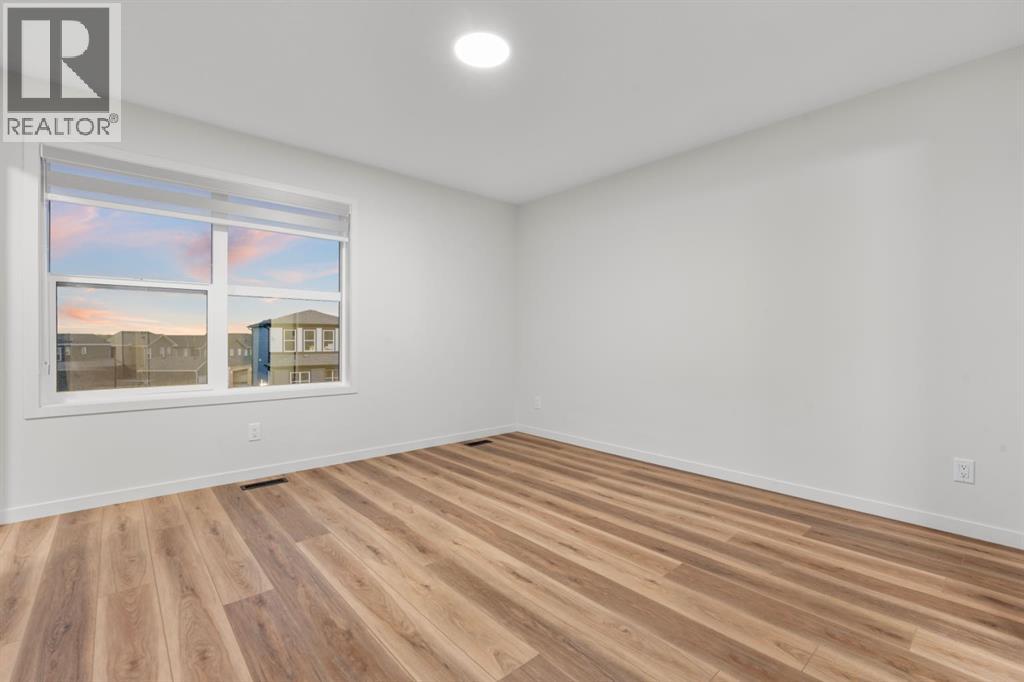 Single Family House for Sale in  Herron Mews NE Livingston Calgary 