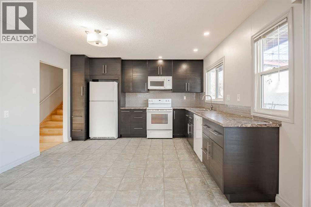 Single Family House 4 Level for Sale in  Brockington Road NW Brentwood Calgary 