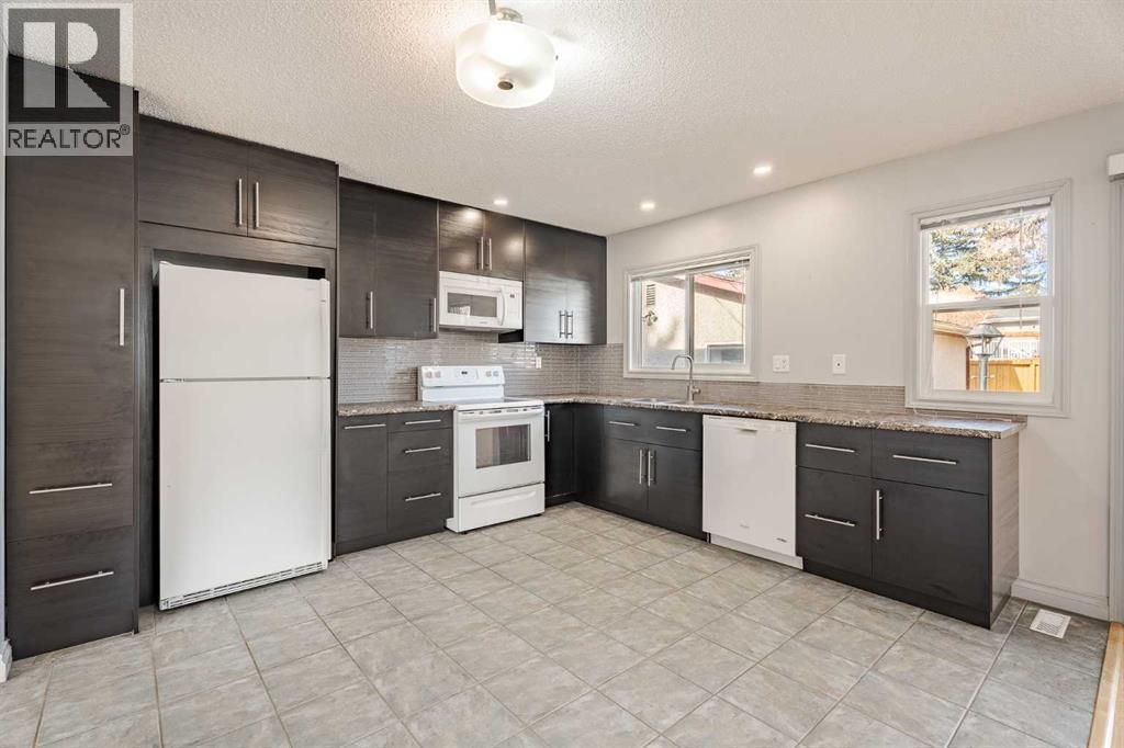 Single Family House 4 Level for Sale in  Brockington Road NW Brentwood Calgary 