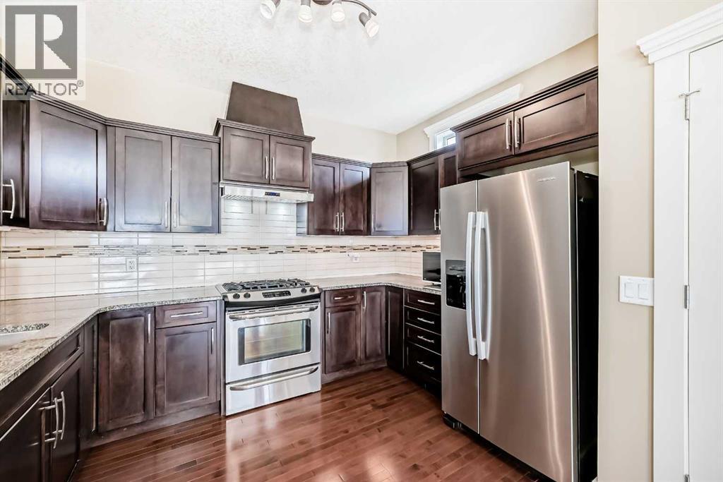 Single Family House Bi-level for Sale in  Rocky Vista Gardens NW Rocky Ridge Calgary 