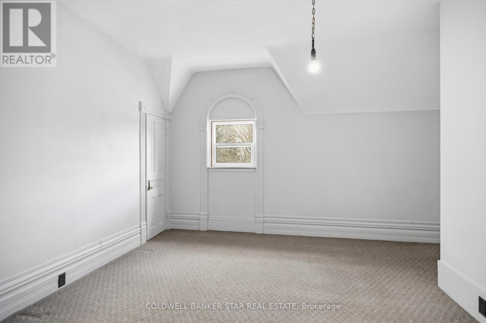 Unit 2 - Basic but quaint upper bedroom.