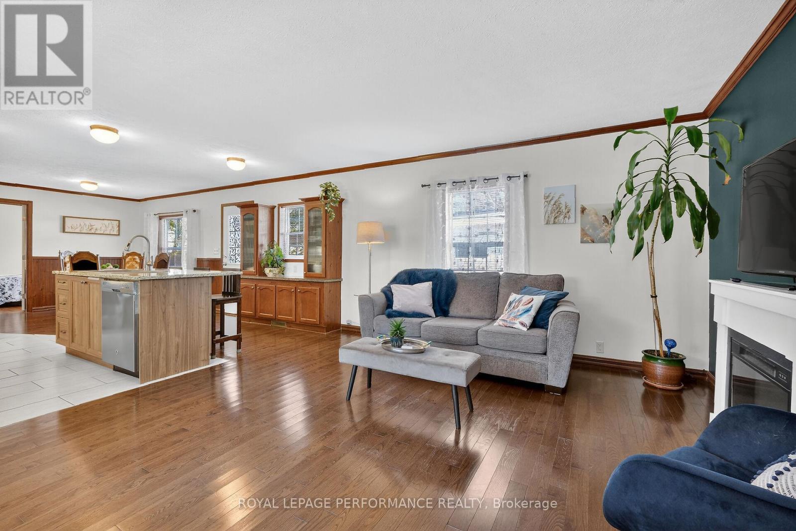 Step inside to a sun-filled, open-concept interior