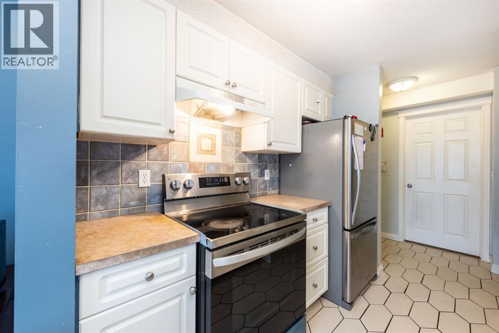 #304 5555 Falsbridge Drive NE - 13