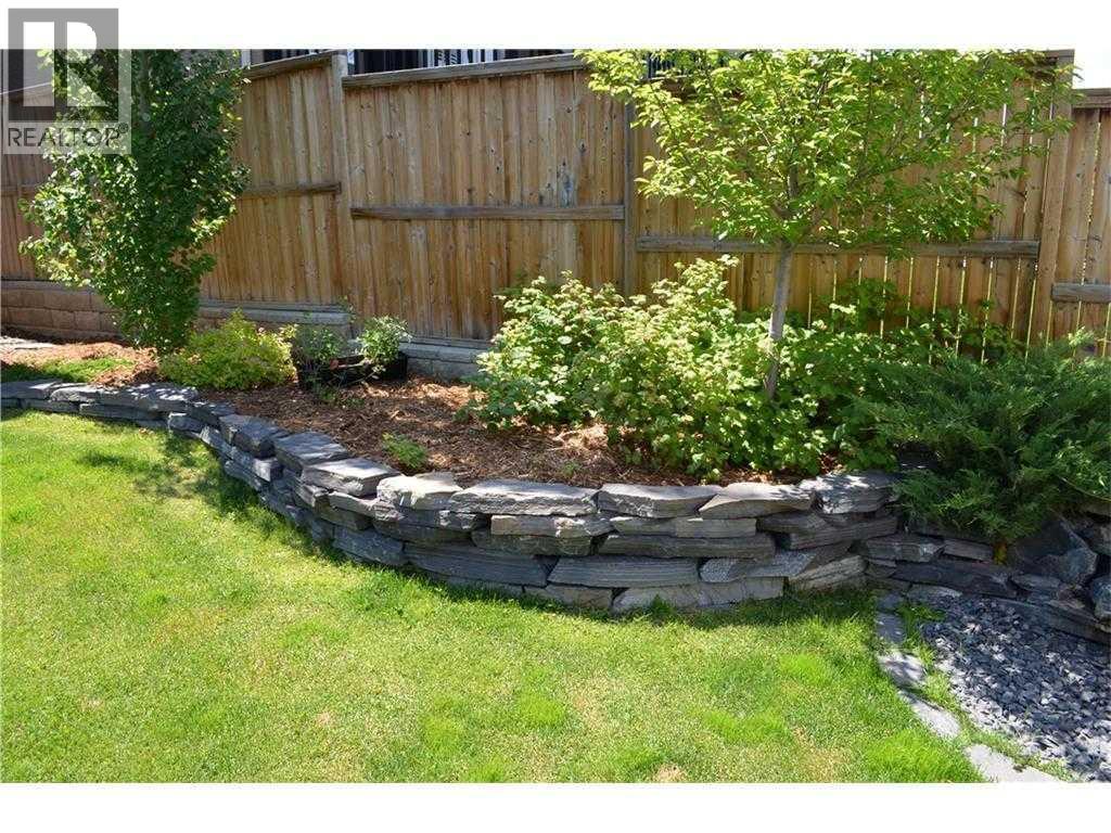 Single Family House for Sale in  Everbrook Way SW Evergreen Calgary 