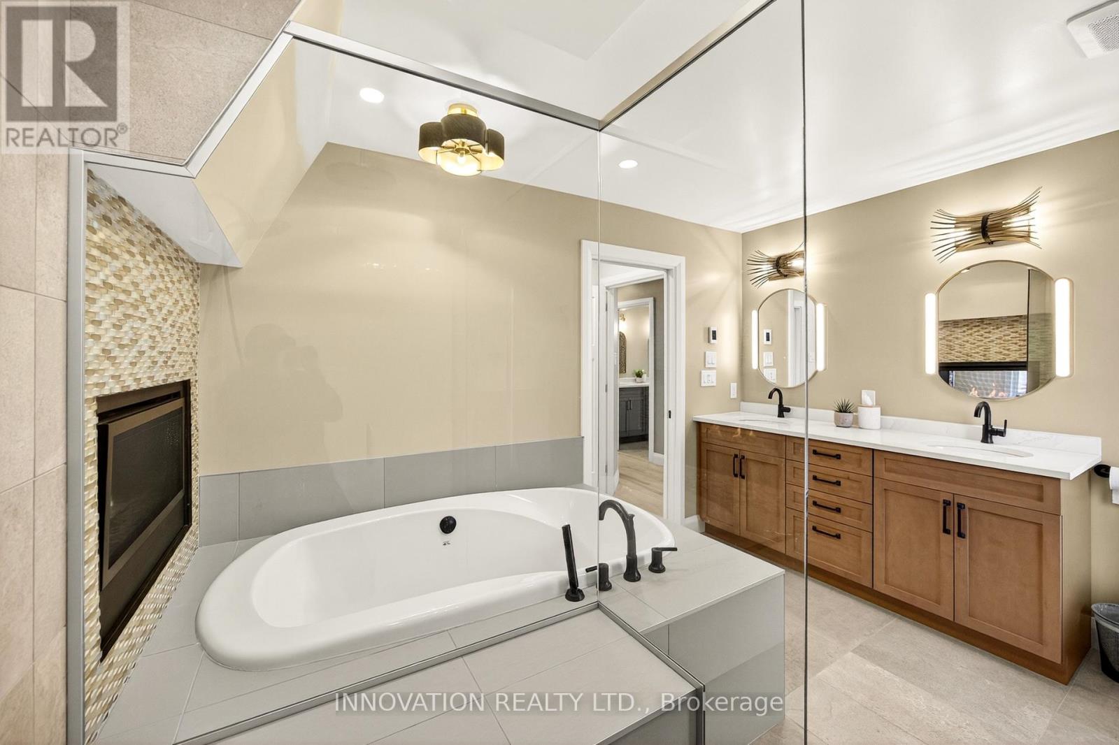 Curbless shower, dual vanities and heated floors