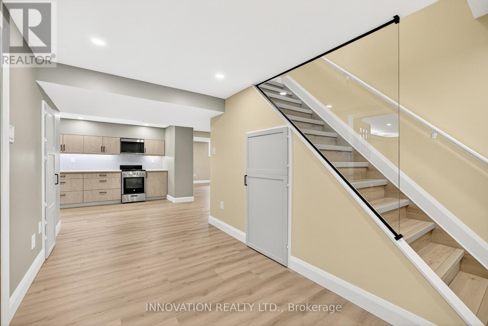 Basement landing with open concept in law suite