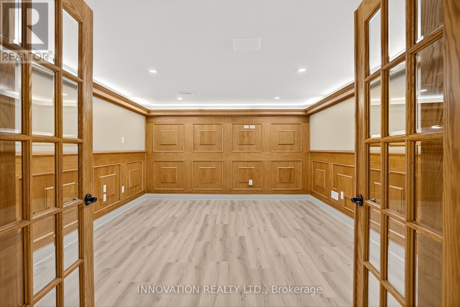 Lower level den with oak panelling