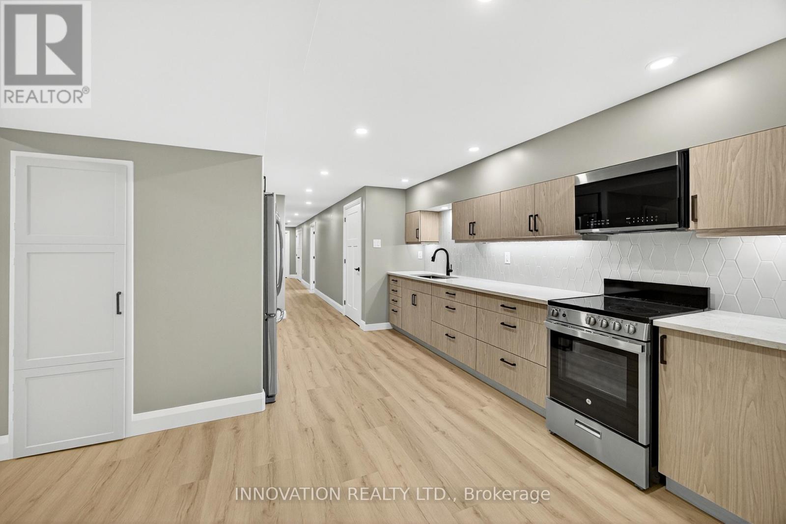Kitchenette with quartz counters