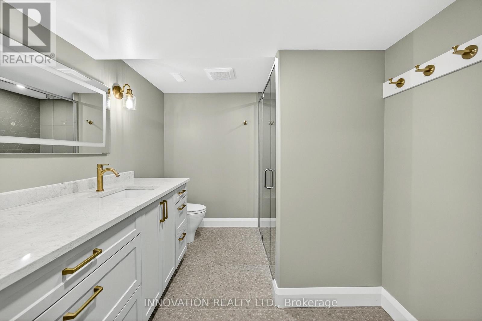 Lower bathroom with quartz counters & heated floor
