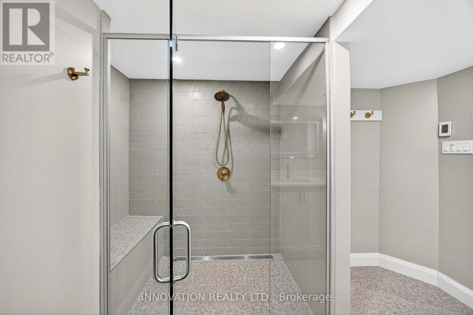Lower level bathroom with curbless shower