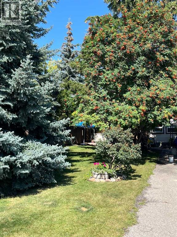 Single Family House 4 Level for Sale in  Ranchview Circle NW Ranchlands Calgary 