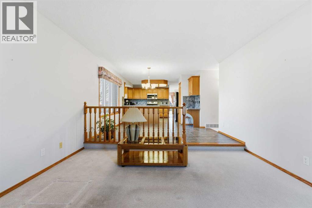 Single Family House Bi-level for Sale in  Sierra Morena Court SW Signal Hill Calgary 