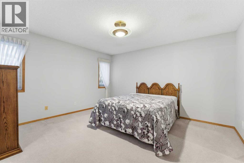 Single Family House Bi-level for Sale in  Sierra Morena Court SW Signal Hill Calgary 