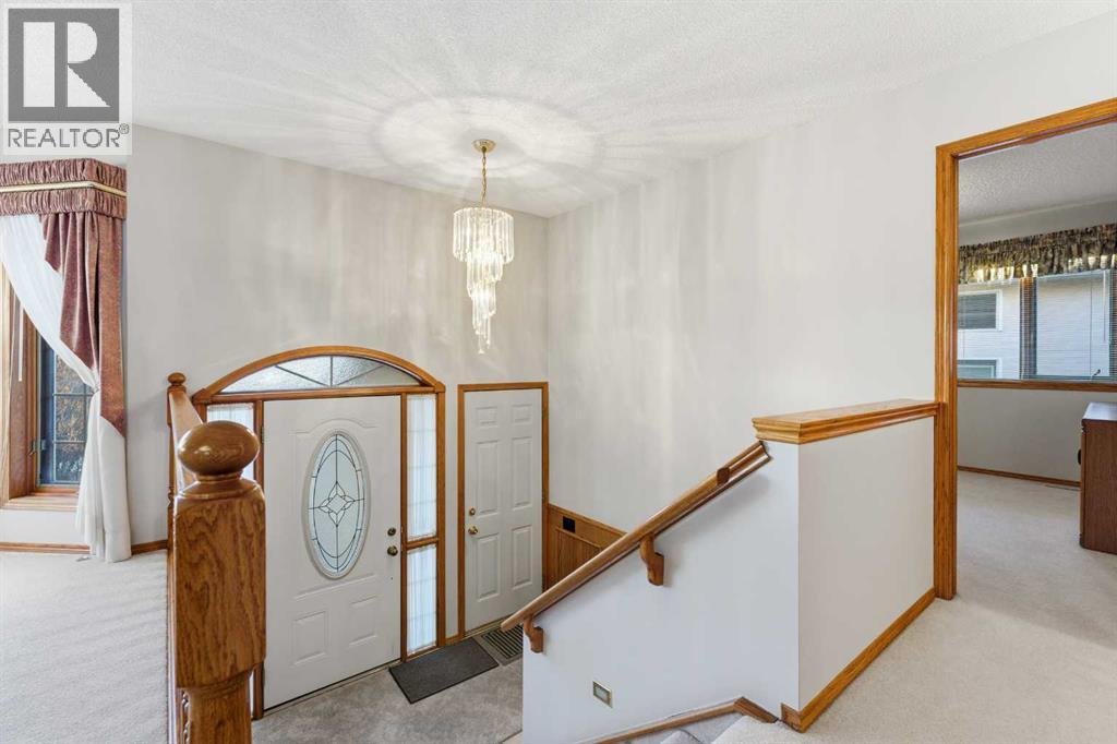 Single Family House Bi-level for Sale in  Sierra Morena Court SW Signal Hill Calgary 