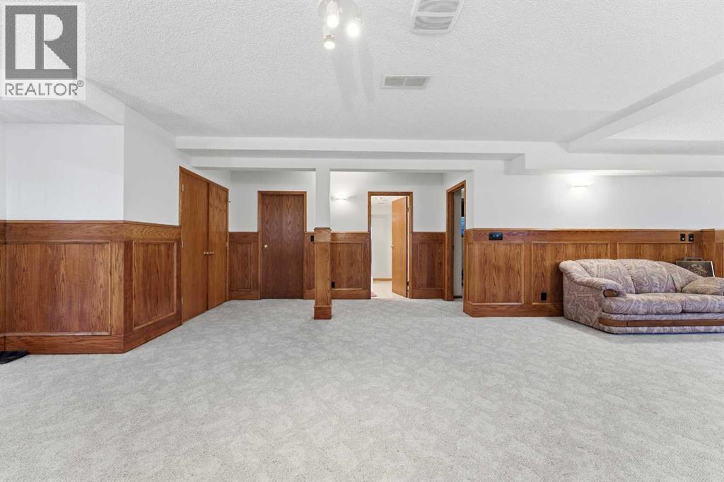 Single Family House Bi-level for Sale in  Sierra Morena Court SW Signal Hill Calgary 