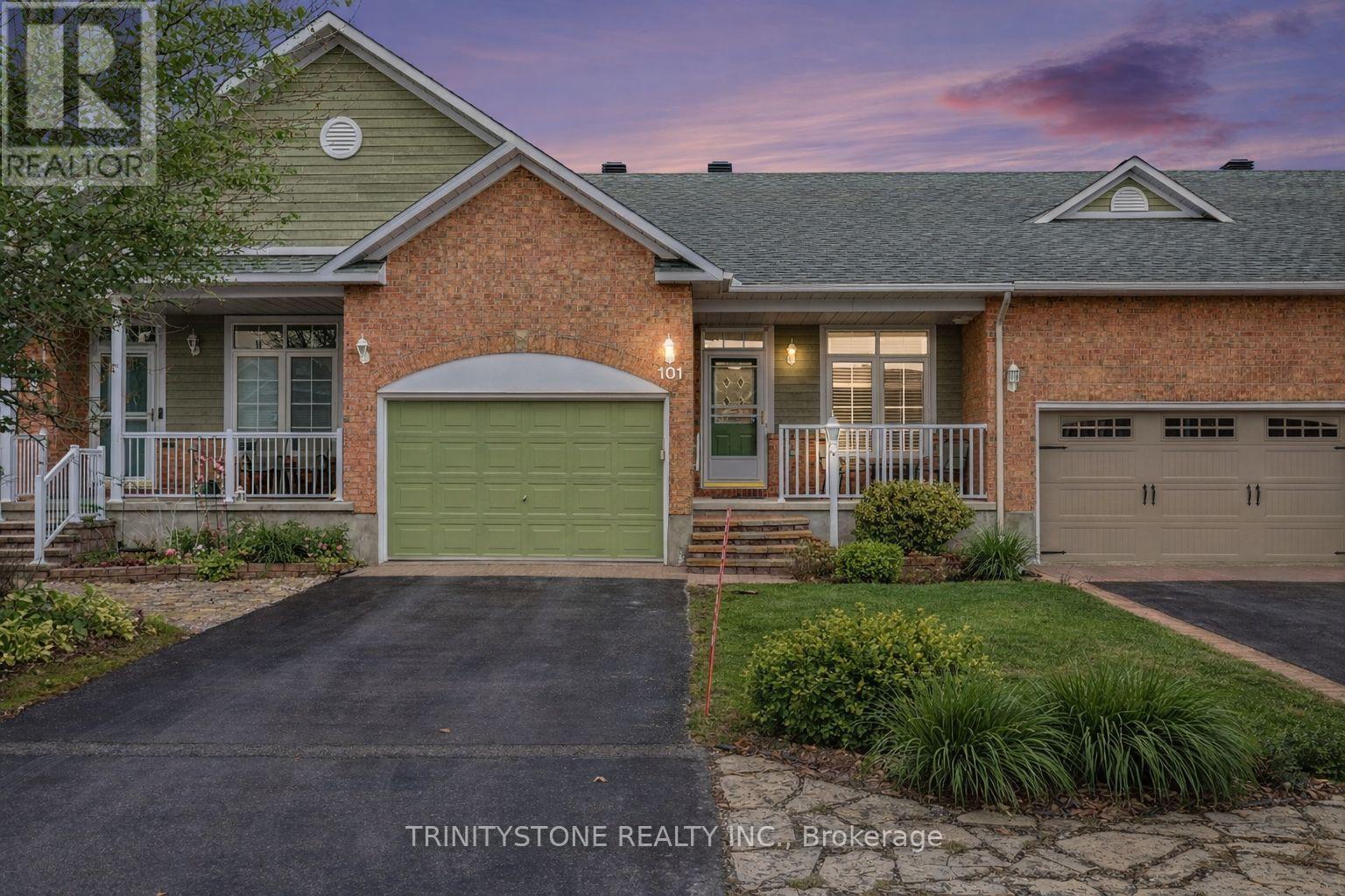 Has been staged to remove snow, appear as summer.