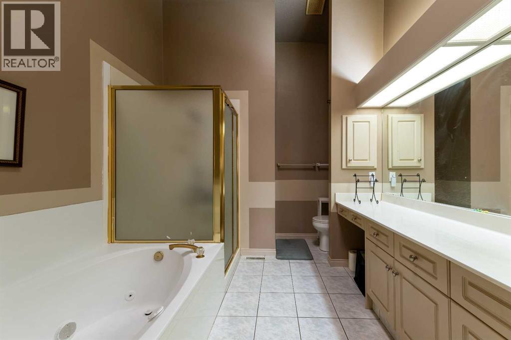 Single Family House Bungalow for Sale in  Sierra Morena Terrace SW Signal Hill Calgary 