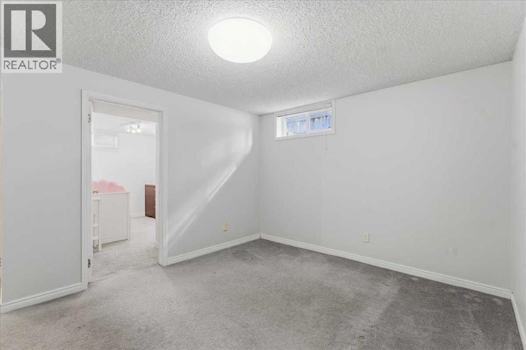 Single Family House Bungalow for Sale in  Waterloo Drive SW Wildwood Calgary 