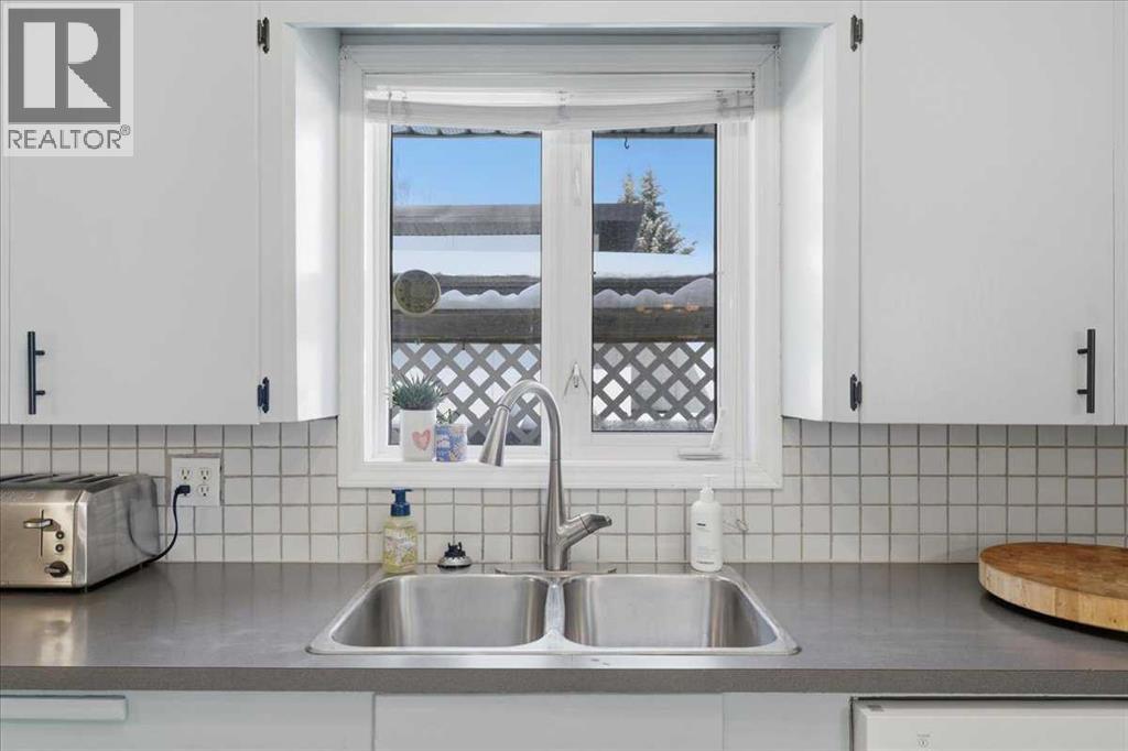 Single Family House Bungalow for Sale in  Waterloo Drive SW Wildwood Calgary 