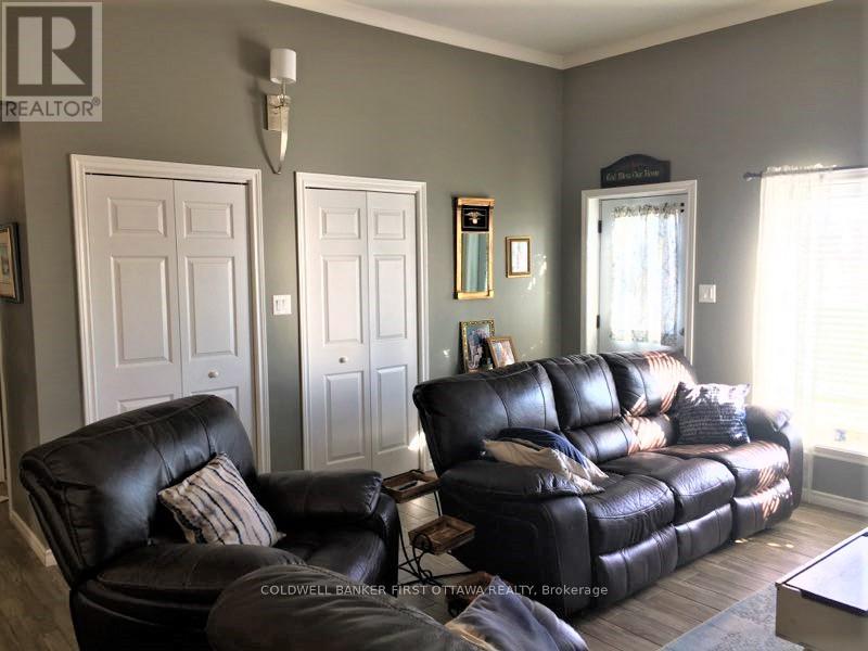 Living room has closet storage