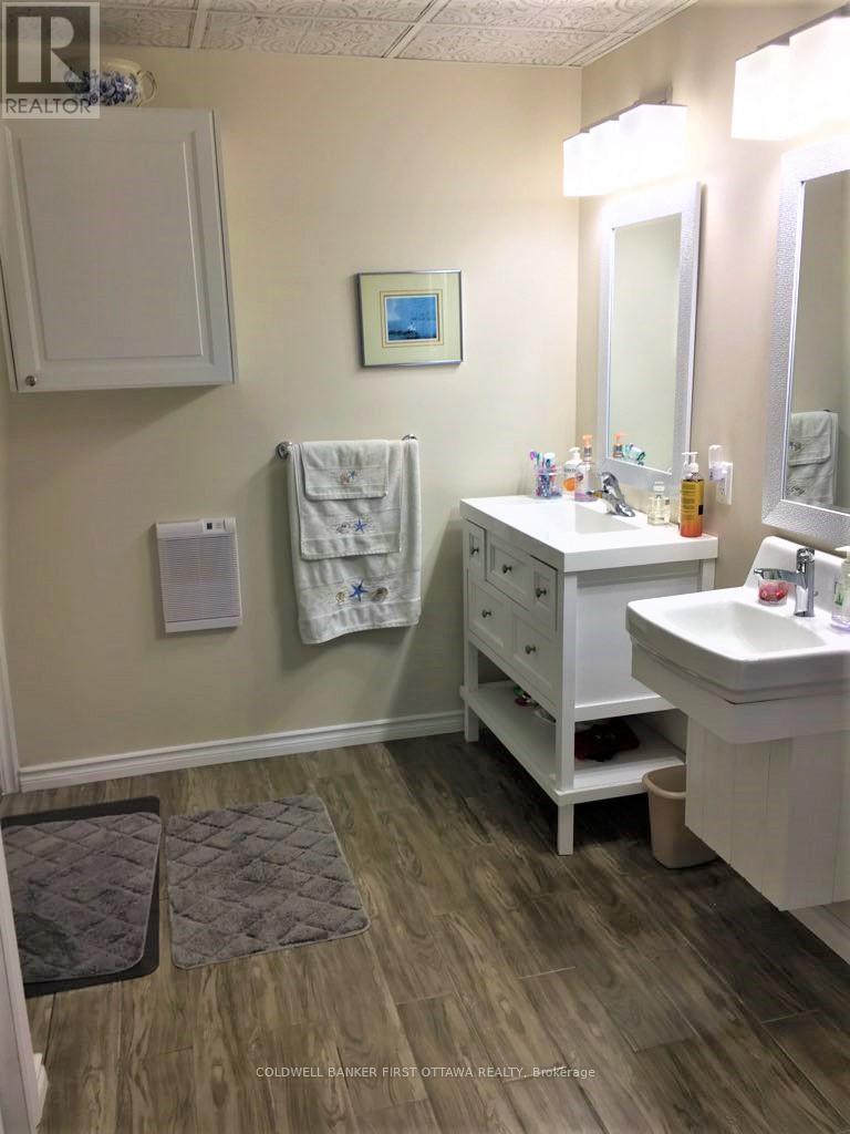 Bungalow bathroom has two vanities