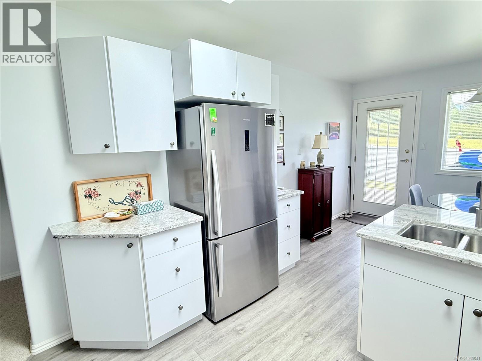 #4 6111 SAYWARD RD - Image 3