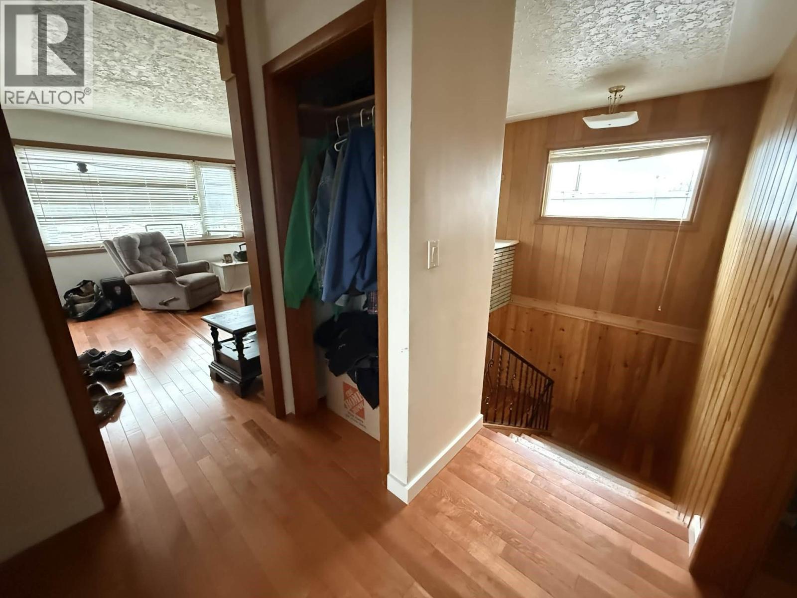 Top of stairs that lead to the living room in the two bedroom suite.