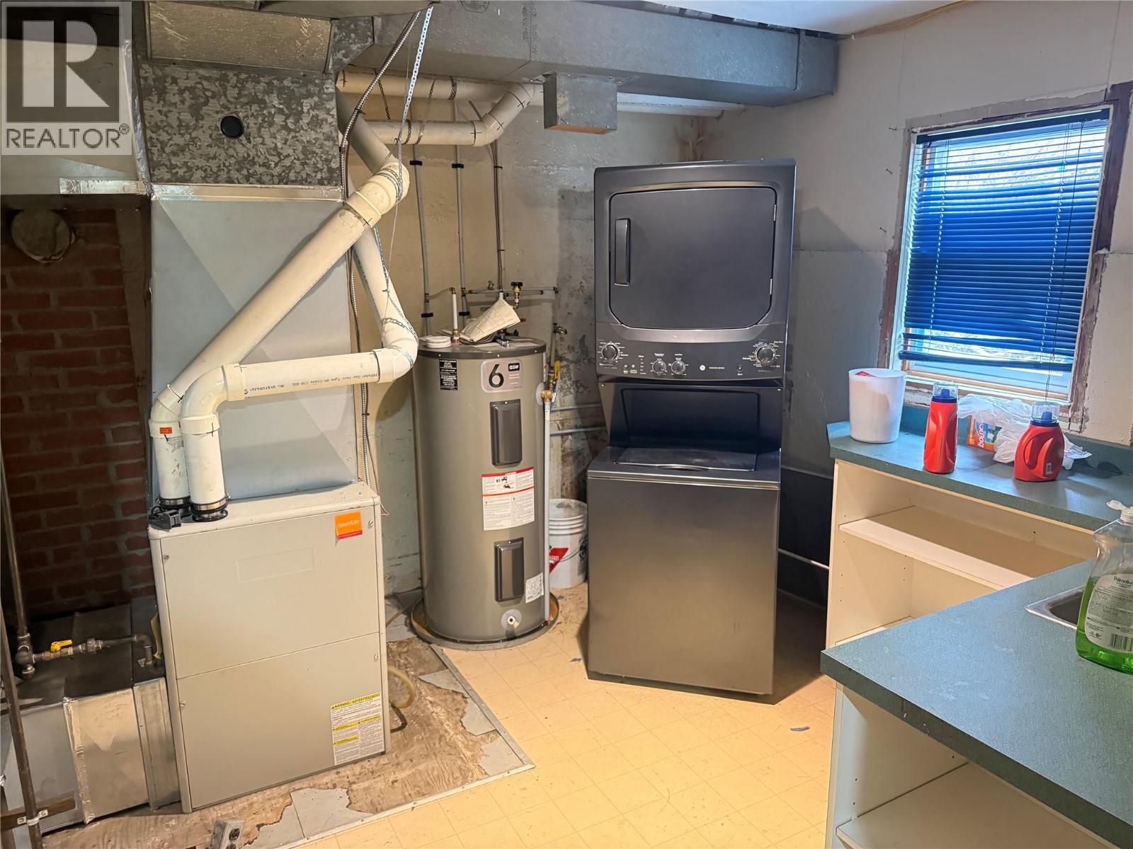 Furnace room and laundry.