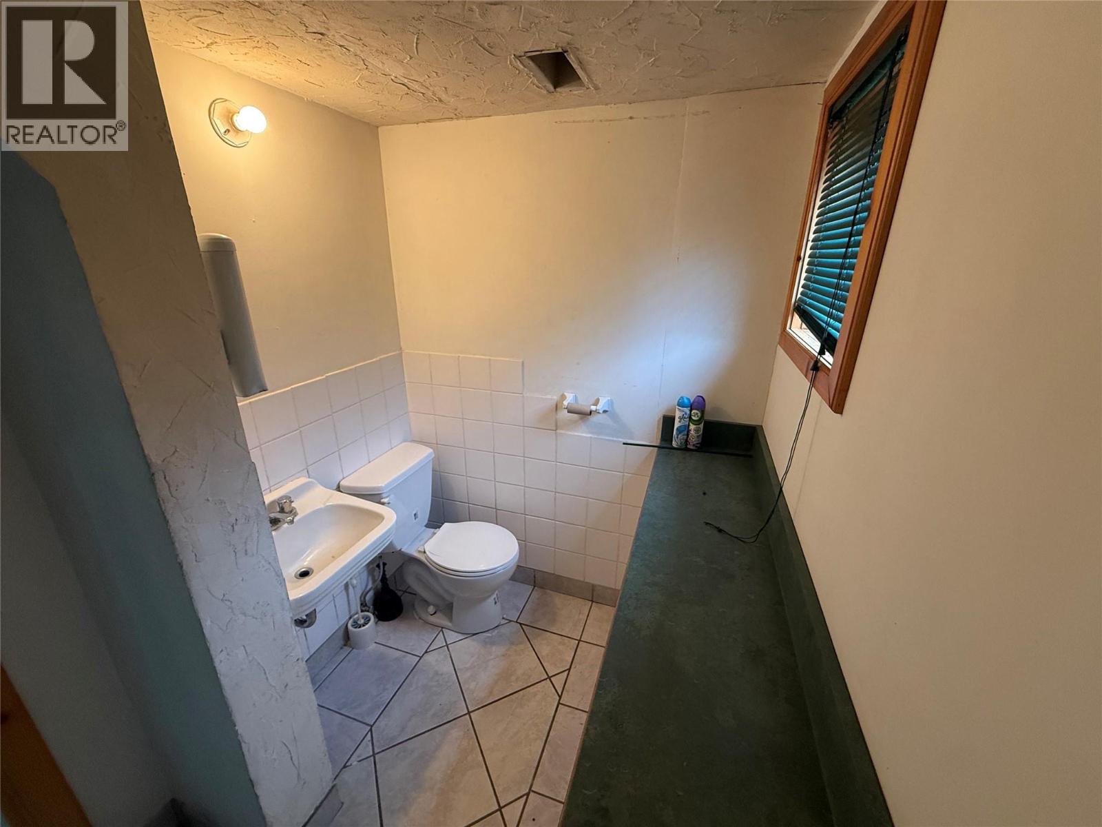 Shared bathroom for warehouses and showroom.