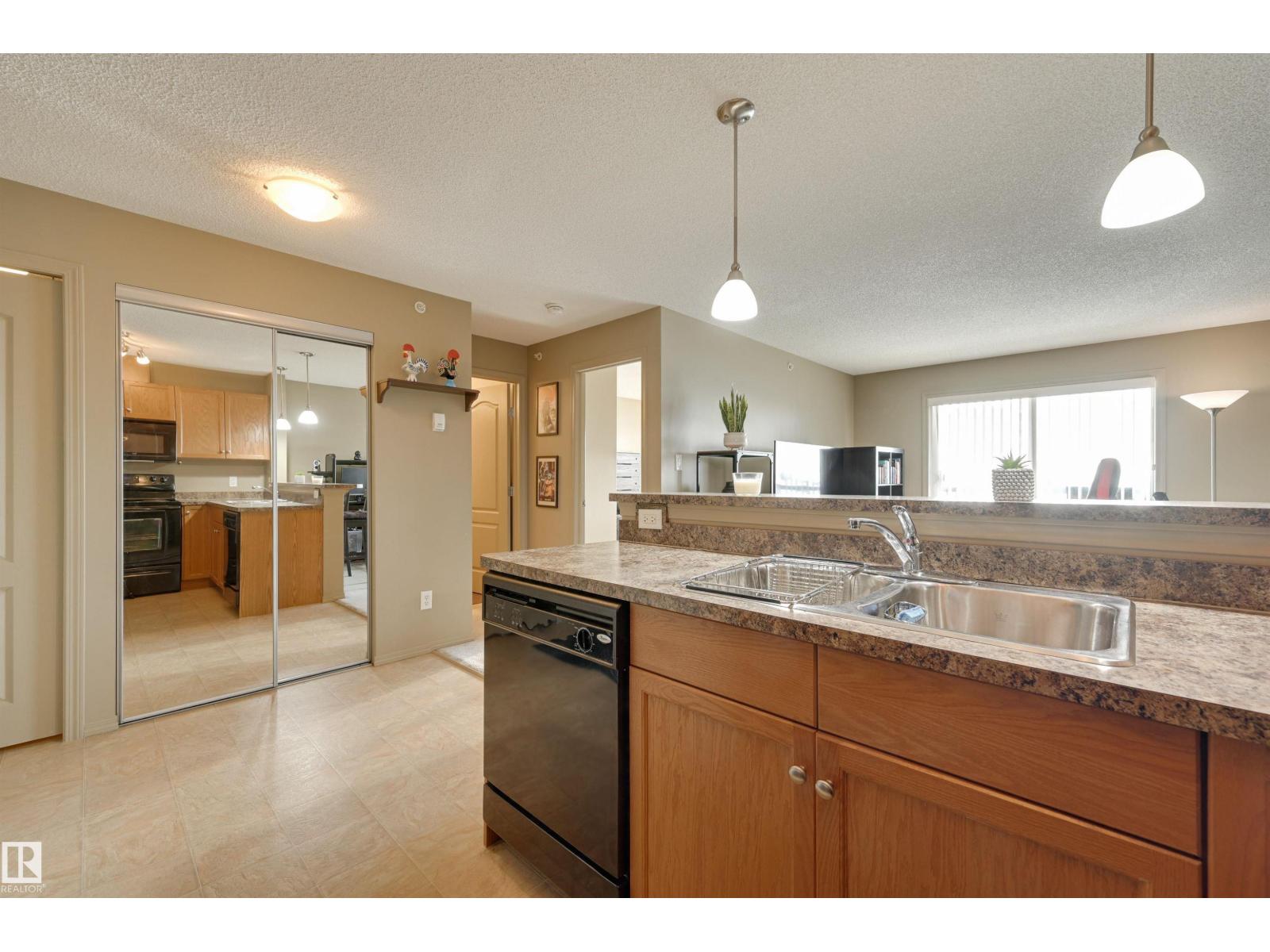 #424 5951 165 AV NW - 5
