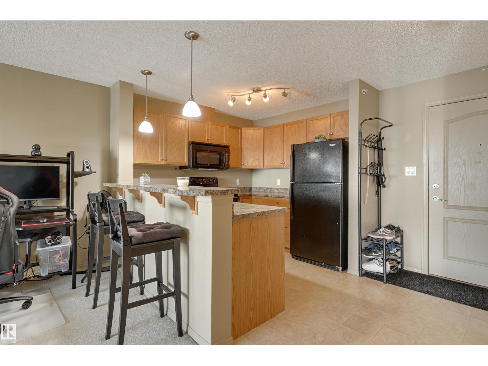 #424 5951 165 AV NW - 9