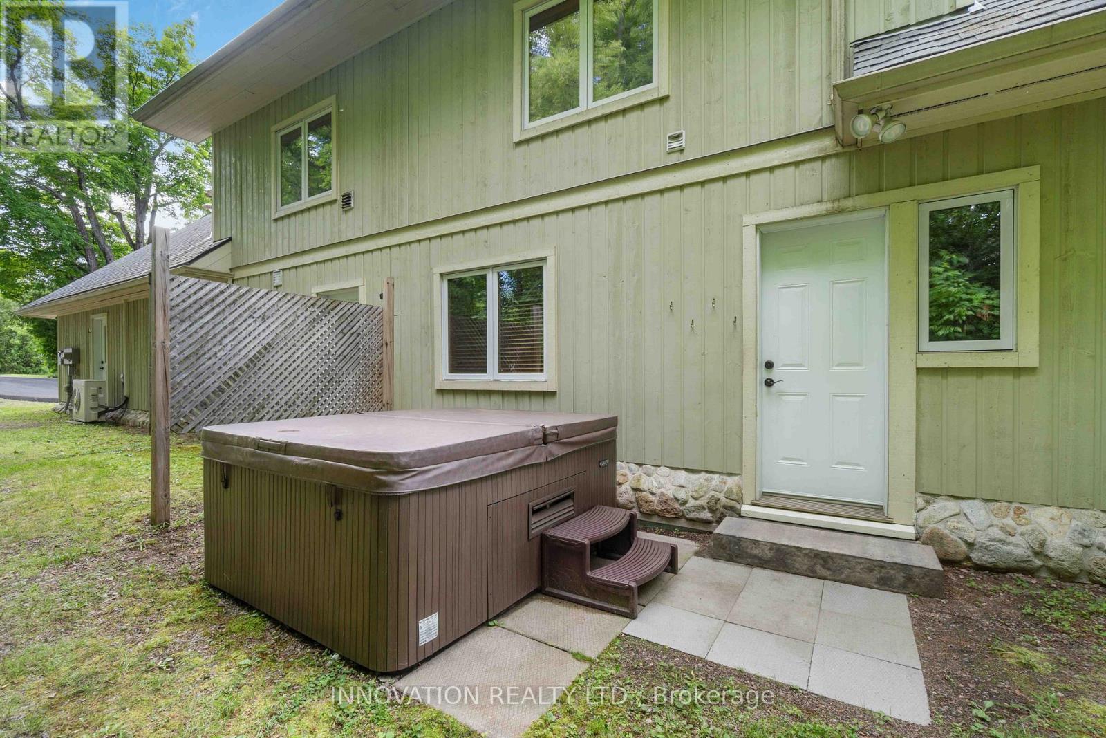 Hot tub off the side of the house, very private.