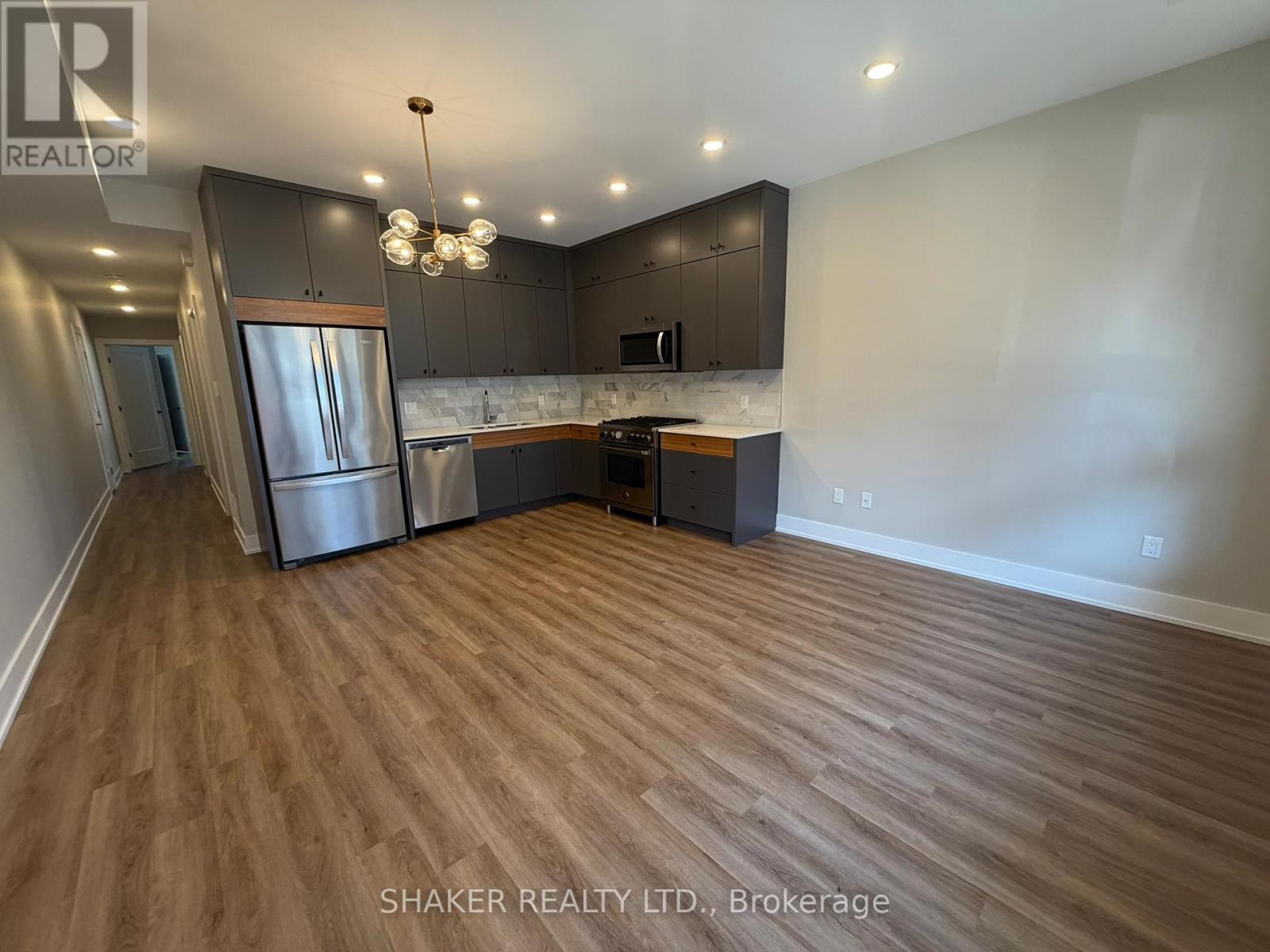 Open concept kitchen and den