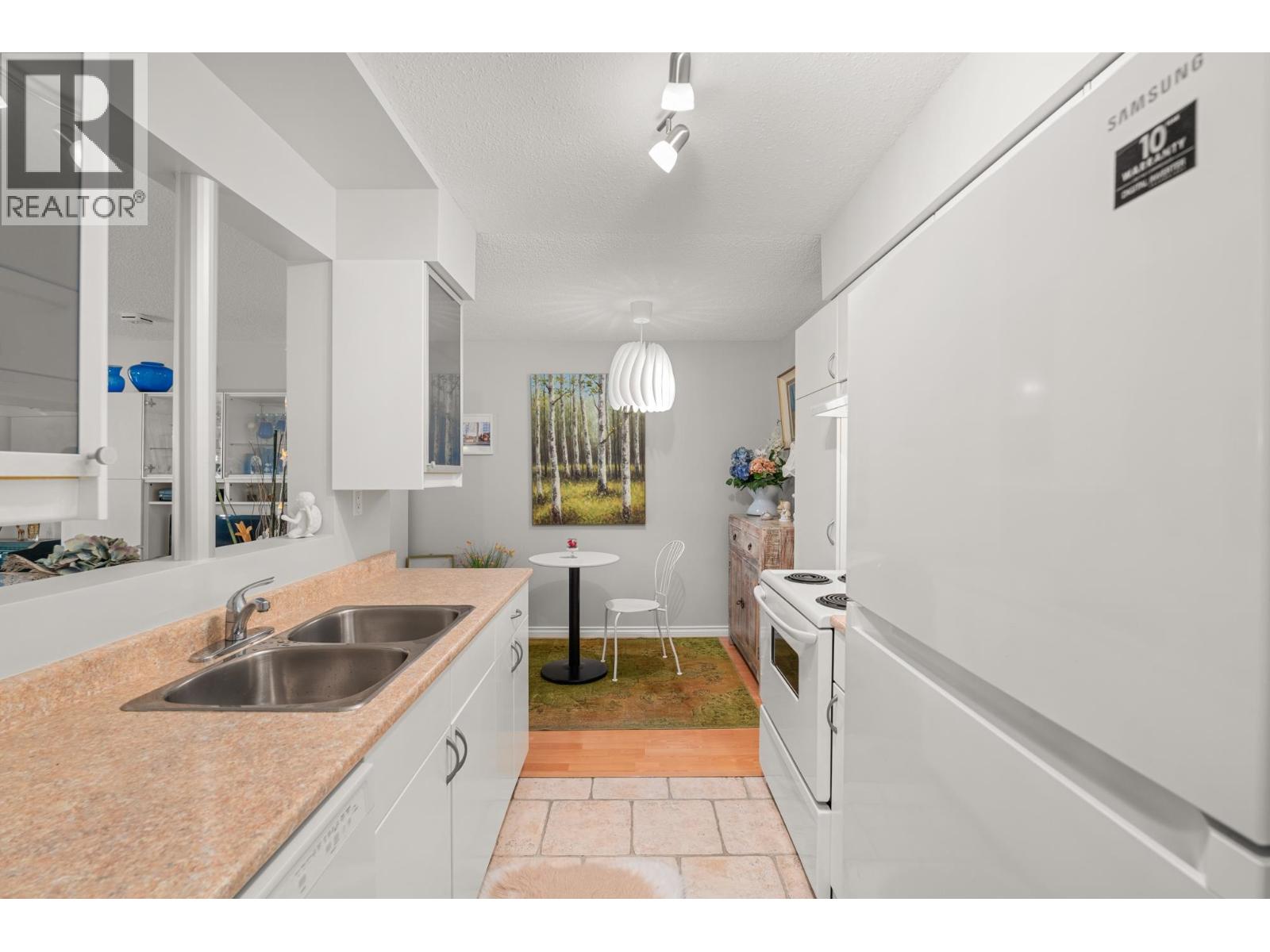 215 4373 HALIFAX STREET — photo 11