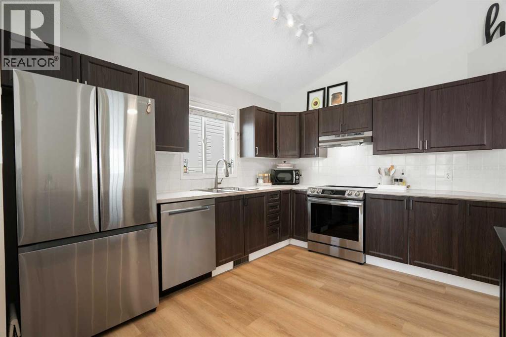 Single Family House Bi-level for Sale in  River Rock Circle SE Riverbend Calgary 