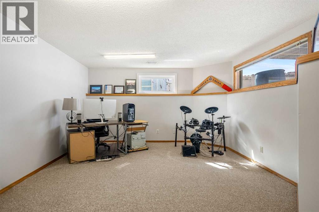 Single Family House Bi-level for Sale in  Riverside Mews SE Riverbend Calgary 