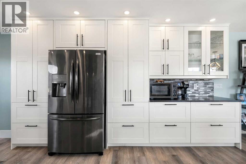 Single Family House Bi-level for Sale in  Riverside Mews SE Riverbend Calgary 