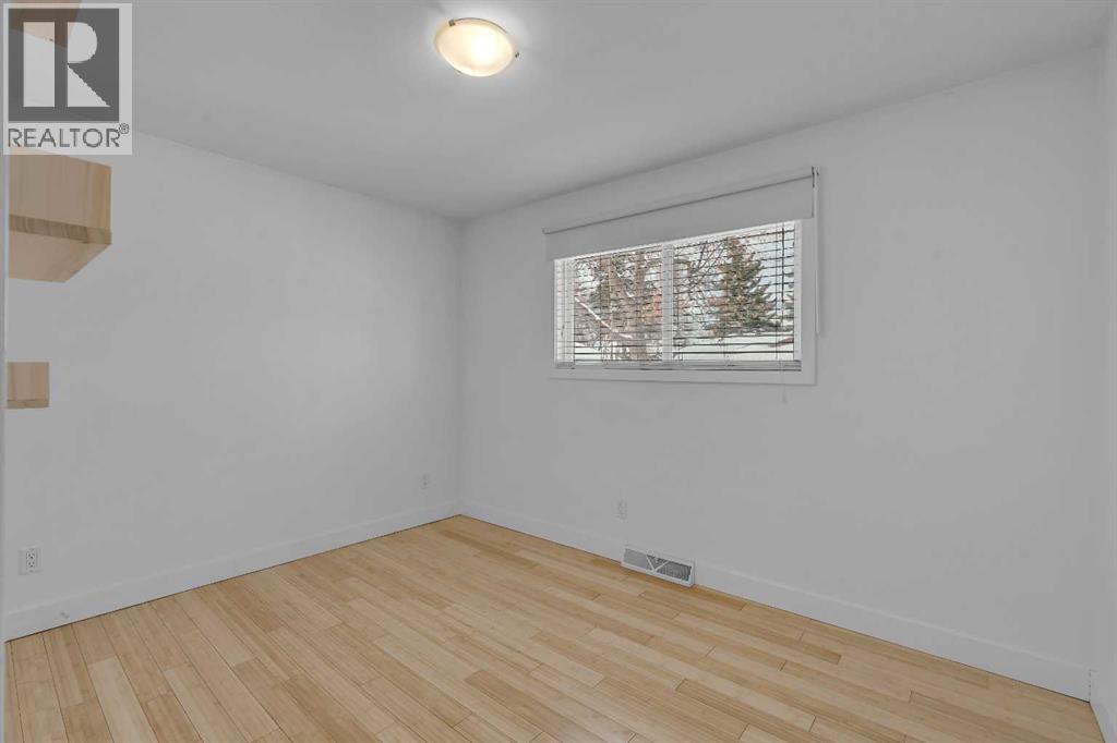 Single Family House Bungalow for Sale in  Langton Drive SW North Glenmore Park Calgary 