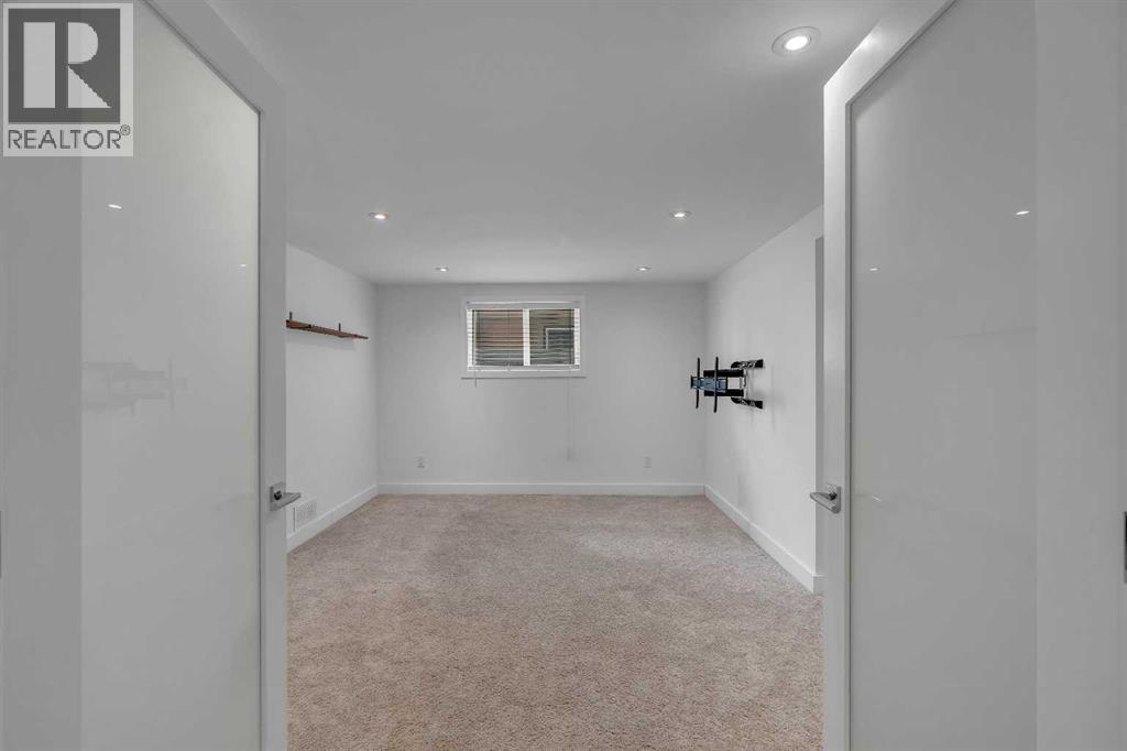 Single Family House Bungalow for Sale in  Langton Drive SW North Glenmore Park Calgary 